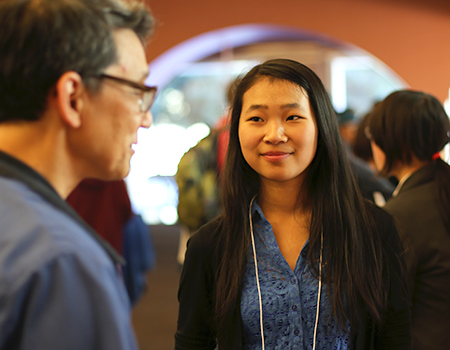 High school student at poster session