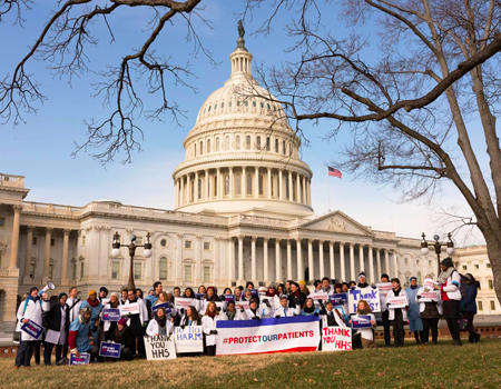 Medical students gather in front of capitol with #ProtectOurPatients signs